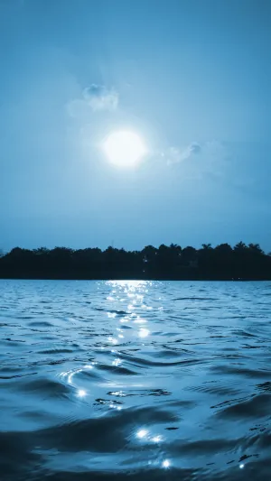 Aesthetic Blue Sea And Sun Wallpaper