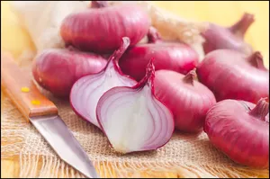 Aesthetic Sliced And Whole Red Onions With Knife Wallpaper