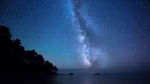 Aesthetic Stars Seen Over The Beach Laptop Wallpaper