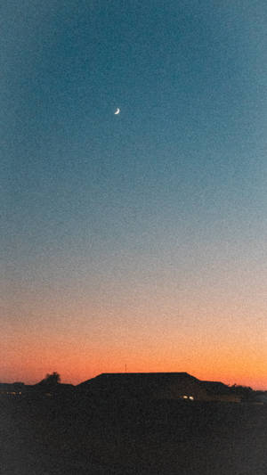 Aesthetic Sunset With House Silhouette Wallpaper