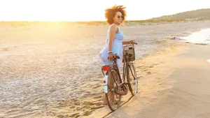 African Woman Holding Her Bike Wallpaper