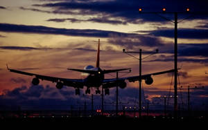 Airplane Landing At The Airport Wallpaper