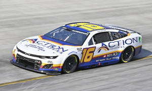 Aj Allmendinger In High-speed Track Action Wallpaper