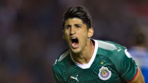 Alan Pulido In A Puma Chivas Guadalajara Uniform Wallpaper