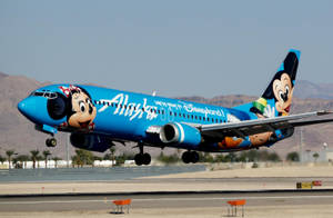 Alaska Airlines Blue Mickey Mouse Plane Wallpaper