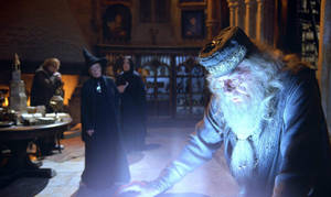Albus Dumbledore Looks Into The Pensieve Wallpaper