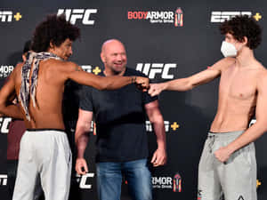 Alex Caceres Fist Bump Chase Hooper Wallpaper