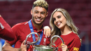 Alex Oxlade-chamberlain And Perrie Edwards Smiling Together Wallpaper