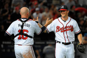 Alex Wood High Fives Brian Mccann Wallpaper