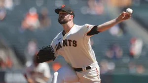 Alex Wood Playing In Baseball Match Wallpaper