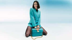 Alexa Chung Teal Ensemblewith Handbag Wallpaper