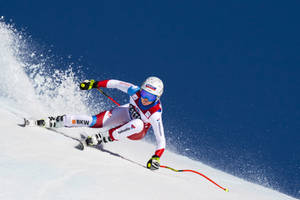 Alpine Skiing Champion, Lara Gut-behrami In Action Wallpaper