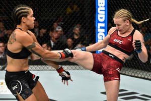 Amanda Nunes Fighting Valentina Shevchenko Wallpaper