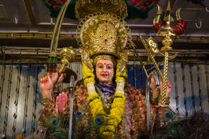 Ambe Maa Goddess With Yellow Garland Wallpaper