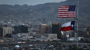 American And Texas Flags In El Paso Wallpaper