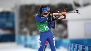 American Biathlon Athlete - Joanne Firesteel Reid In Action Wallpaper