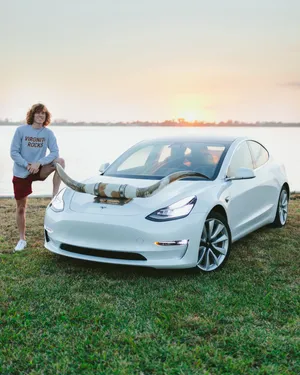American Celebrity Danny Duncan Tesla Model 3 Wallpaper