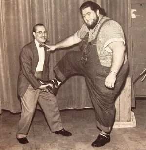 American Professional Wrestler Haystacks Calhoun With Comedian Groucho Marx Wallpaper