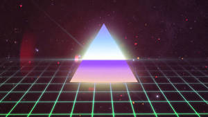 An 80s Grid Of Neon Triangles Wallpaper