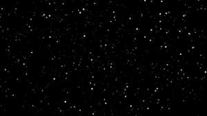 An Aesthetic Star Laptop On A Desk Wallpaper