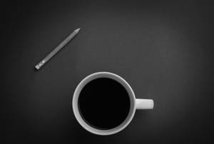 An Enjoyable Cup Of Black Coffee Wallpaper