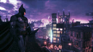 An Illuminated Batman City Skyline As Night Falls Wallpaper