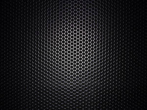 An Up-close Look Of Carbon Fiber Hex-patterned Design Wallpaper