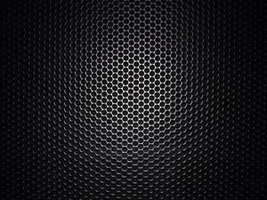 An Up-close Look Of Carbon Fiber Hex-patterned Design Wallpaper