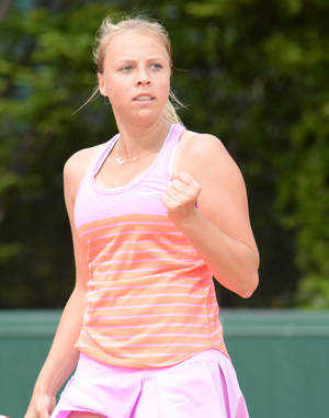 Anett Kontaveit Wearing Pink Fist Pump Wallpaper