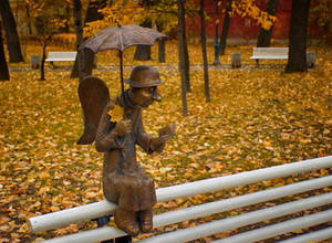 Angel Statue Reading A Book Wallpaper
