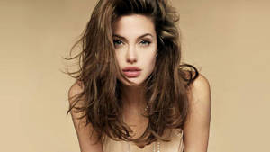 Angelina Jolie Looking Stunning In Beige Wallpaper