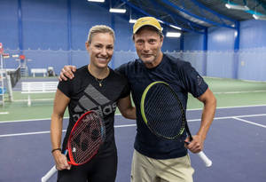 Angelique Kerber With Her Tennis Partner Wallpaper