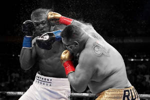 Anthony Joshua Defending Punch Wallpaper