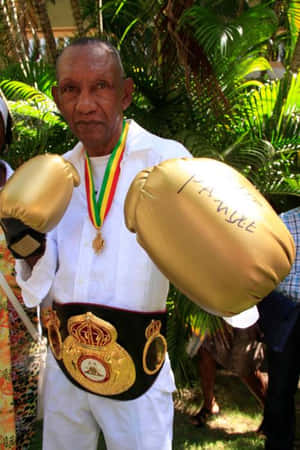 Antonio Cervantes Golden Gloves And Champion Belt Wallpaper