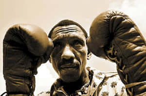 Antonio Cervantes Wearing Gloves In A Boxing Position Wallpaper