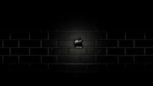 Apple Logo On A Brick Wall In The Dark Wallpaper