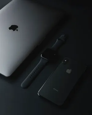 Apple Products Dark Minimalist Wallpaper