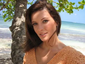 April Bowlby Near A Tree At The Beach Wallpaper