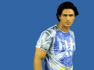 Arjun Rampal On Blue Background Wallpaper