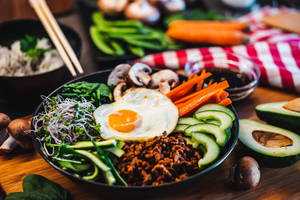 Aromatic And Healthy Bibimbap Dish Wallpaper