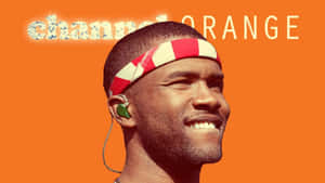Artist Frank Ocean Using His Laptop In His Studio Wallpaper