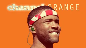 Artist Frank Ocean Using His Laptop In His Studio Wallpaper