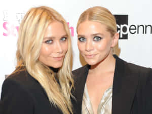 Ashley Olsen Looking Glamorous In A Stylish Outfit Wallpaper