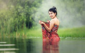 Asian Women Bathing In The River Wallpaper