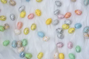 Assorted-color Easter Eggs On White Textile Wallpaper