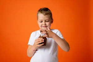 Attitude Boy With Jar Of Chocolate Wallpaper
