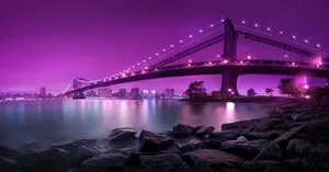 Attractive Purple Bridge At Night Wallpaper