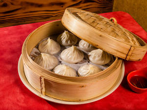 Authentic Chinese Xiaolongbao Dumplings In Bamboo Steamer Wallpaper