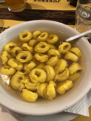 Authentic Tortellini In Brodo Served In A Restaurant Wallpaper