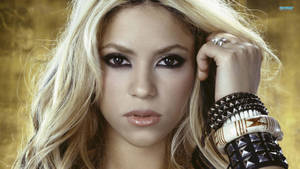 Award-winning Pop Artist, Shakira, Donning A Stylish Black Bracelet Wallpaper